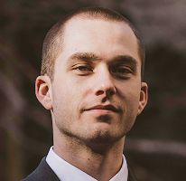 Portrait of Thomas Whitfield, a cryptocurrency market analyst and trading specialist