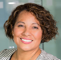 Portrait of Claire Ashford, head of compliance, focused on financial regulation matters